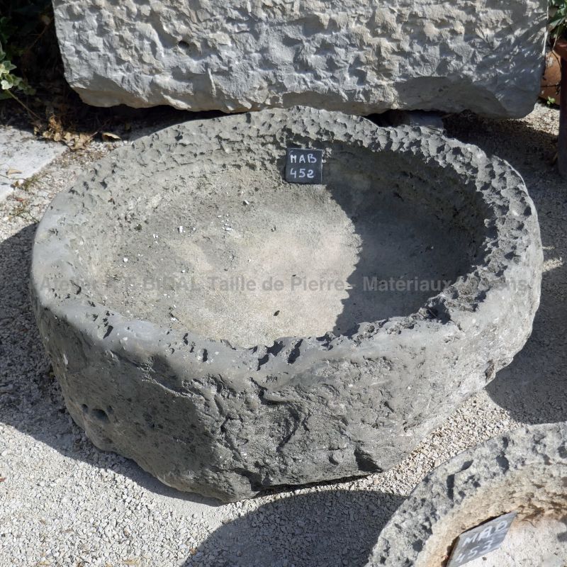 Reclaimed circular stone trough : a shallow trough in stone for sale at Antique Materials in Provence Alain BIDAL