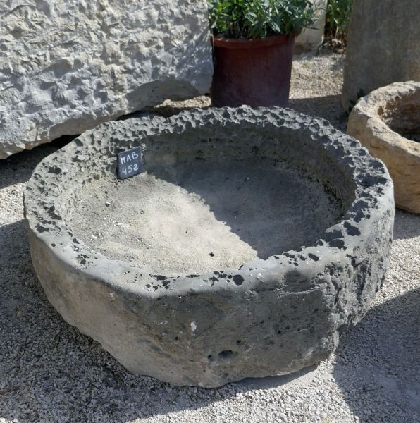 Circular trough in stone by the Antique Materials in Provence Alain BIDAL