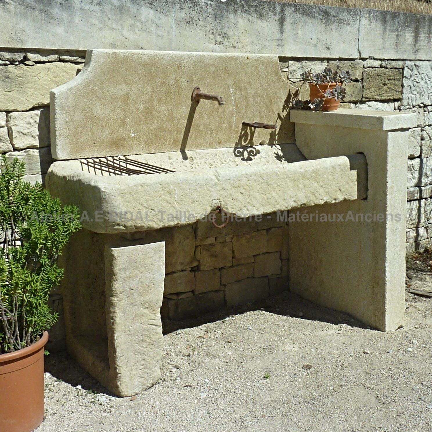 Alain Bidal, a natural stone specialist and craft maker of stone kitchens and stone sinks.