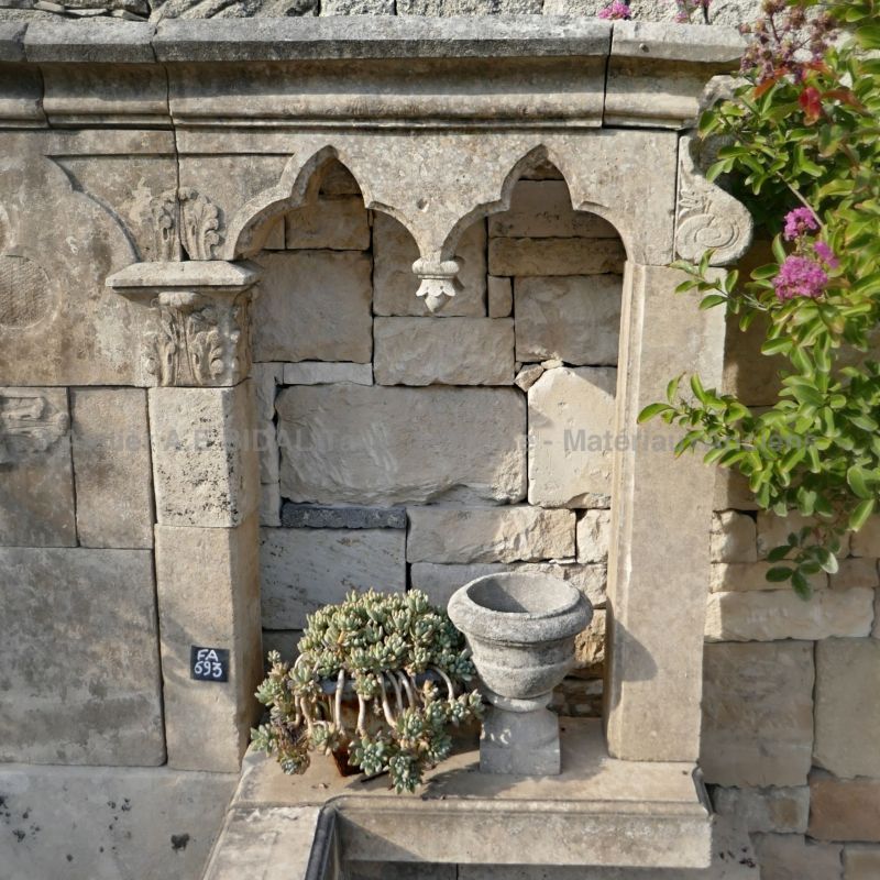 Fountain made of antique stones with a Gothic style inspiration