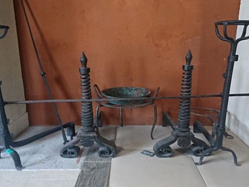 Wide choice of antique fireplace accessories on sale at Alain Bidal in Provence.