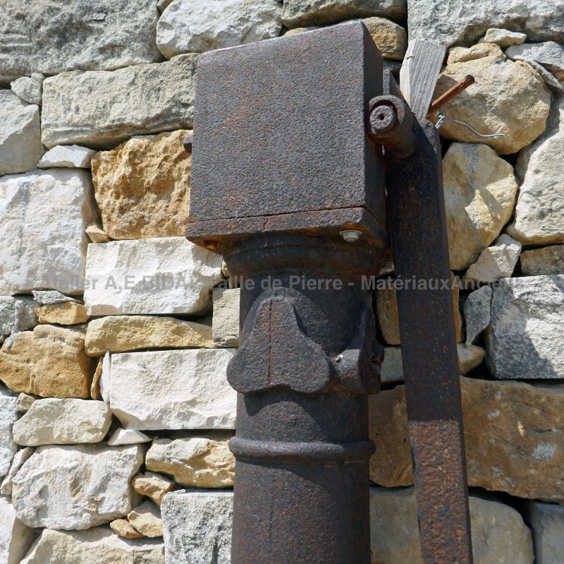 Antique hand pump made of old cast iron by Atelier Alain BIDAL