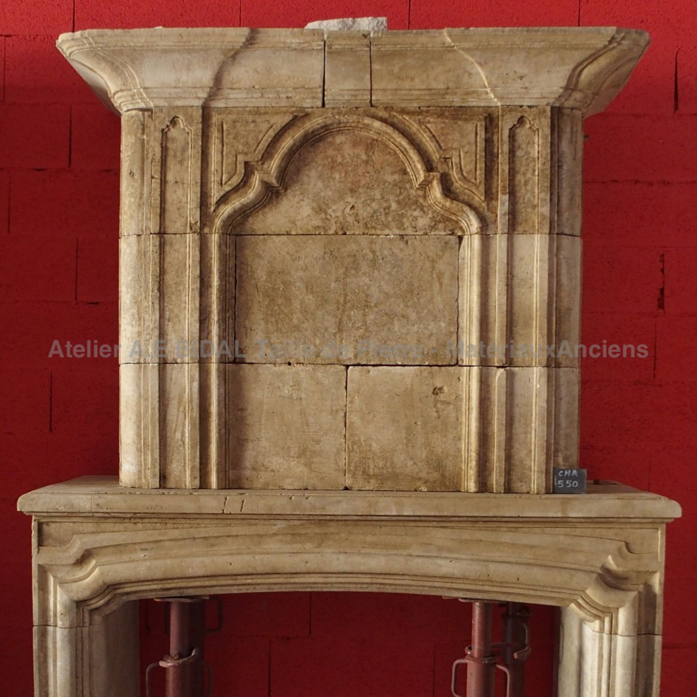 Antique stone fireplace  - a traditional, robust and elegant fireplace.