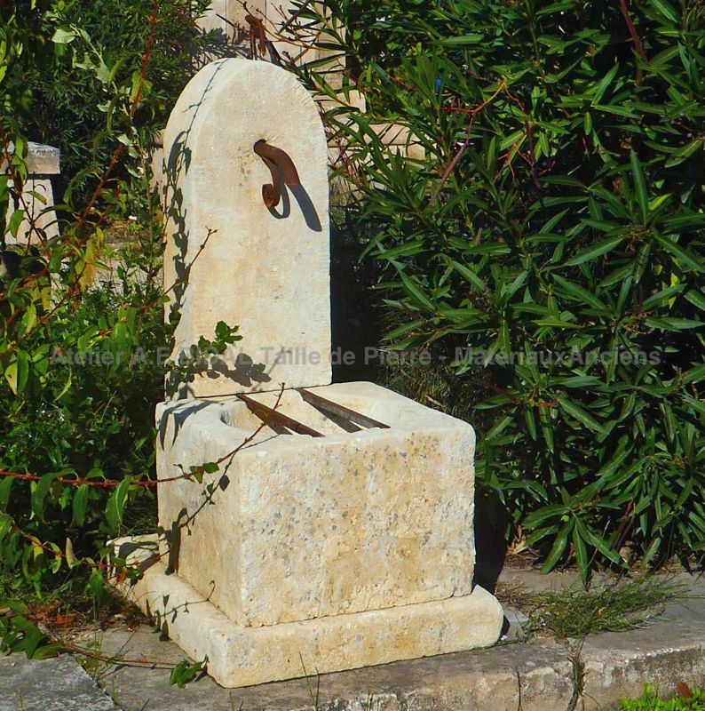 Small stone fountain, an affordable and easy to install water feature : Atelier Alain BIDAL (Provence)