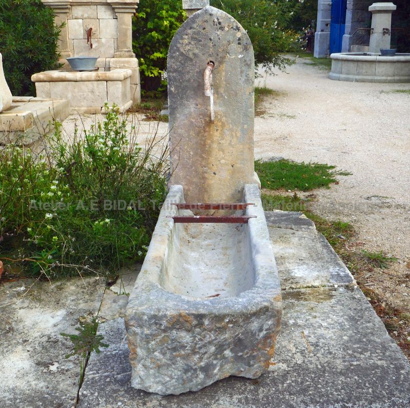 Outdoor fountain with old rectangular trough for sale in Provence at Atelier Alain BIDAL
