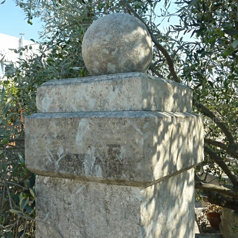 Pillar in ancient stone - detail of the capital of our beautiful pair of ancient pillars for entrance or gate.